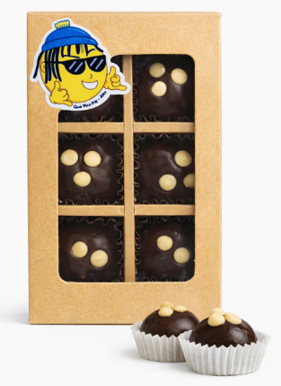 Trufas rellenas de arequipe cubiertas con ganache de chocolate de leche